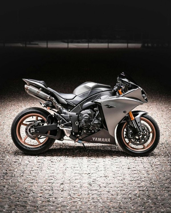 How do I adjust the carburetor on a Yamaha XS400 for high altitude operation?